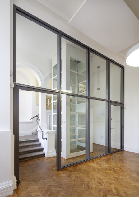 Slim framed glazed office partition with door